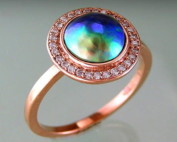 Rosegold Diamond set halo ring with blue-green-pink Paua pearl